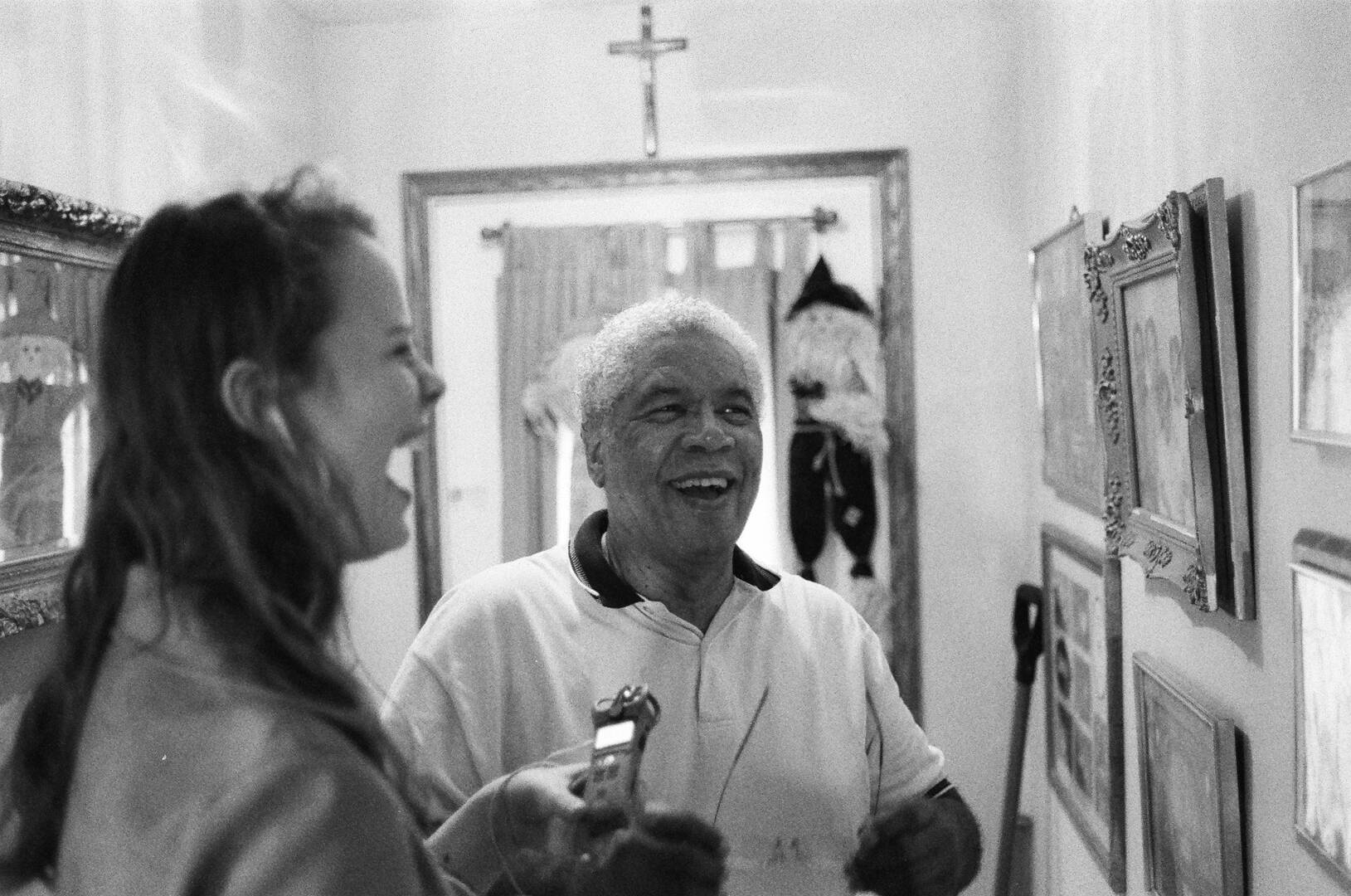 Phillip Clipps at his home with Erika Rasmussen of America