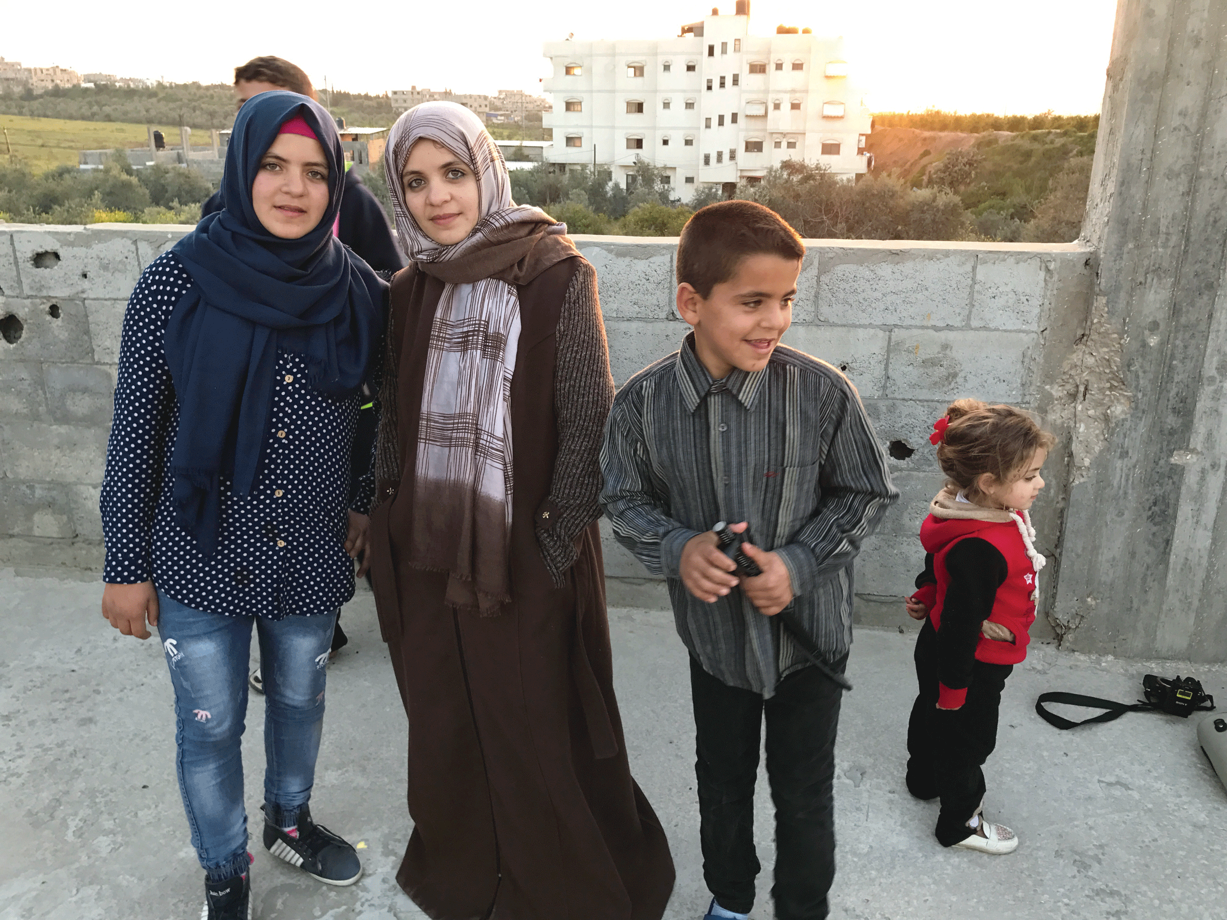 The Husam Family lives directly in the flight path of Israeli rockets. (America Media staff)