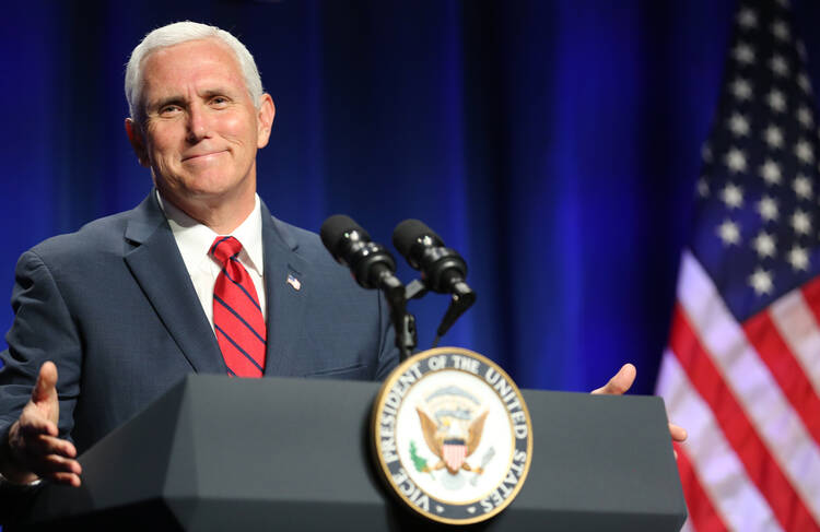 U.S. Vice President Mike Pence gestures as he speaks during the National Catholic Prayer Breakfast June 6 in Washington. (CNS photo/Bob Roller)