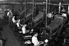 Linotype operators of The Chicago Defender. Photo by Russell Lee. Source: US Library of Congress.